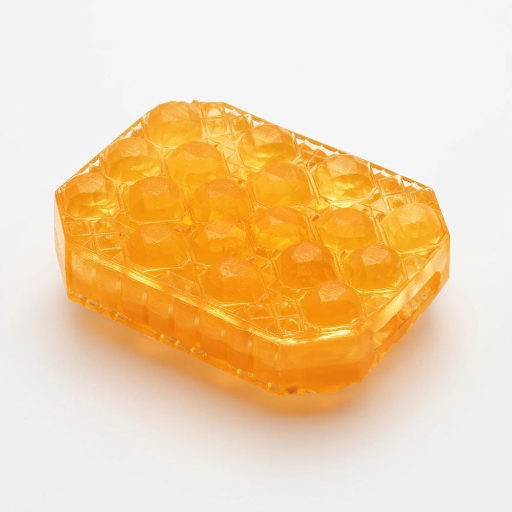 Оранжевый мастурбатор-стимулятор tenga uni topaz