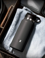Серый мастурбатор в виде бутылки f*ck flask