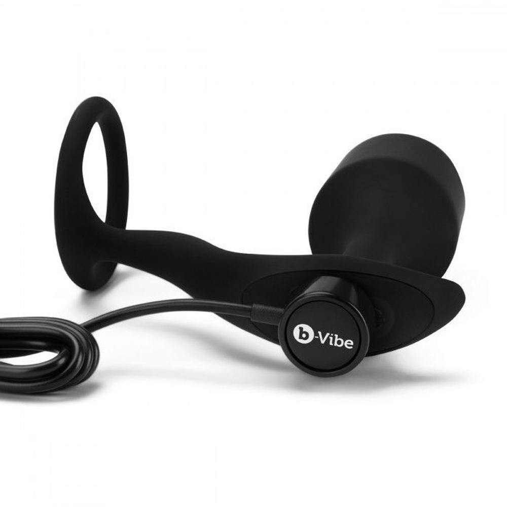 Черная анальная вибропробка с эрекционным кольцом Vibrating Snug & Tug